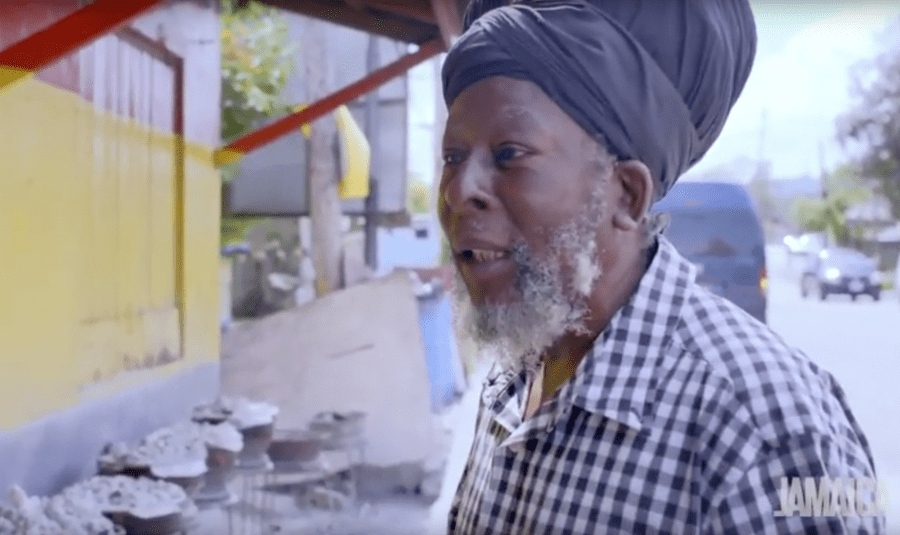 Jamaican Man Cooking Street Food