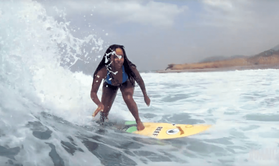 Woman surfing in Jamaica
