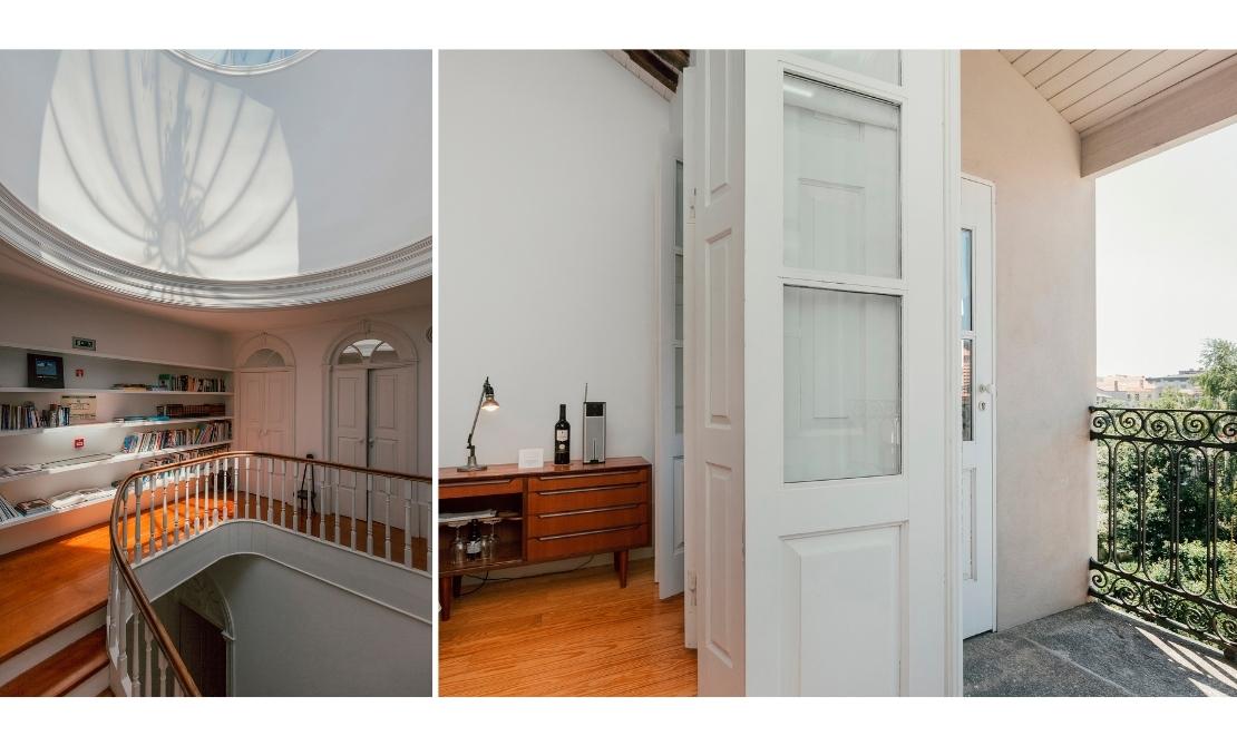 The interior of Rosa et Al hotel with white walls and wooden furniture
